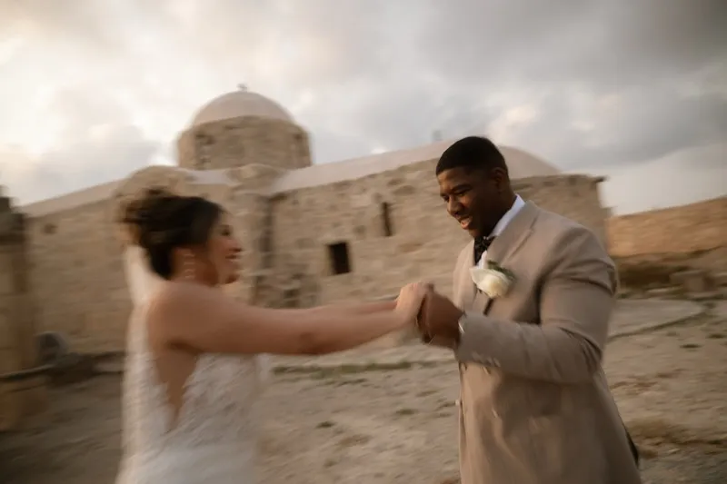 Beach ceremony at Anassa with the Akamas peninsula in the background