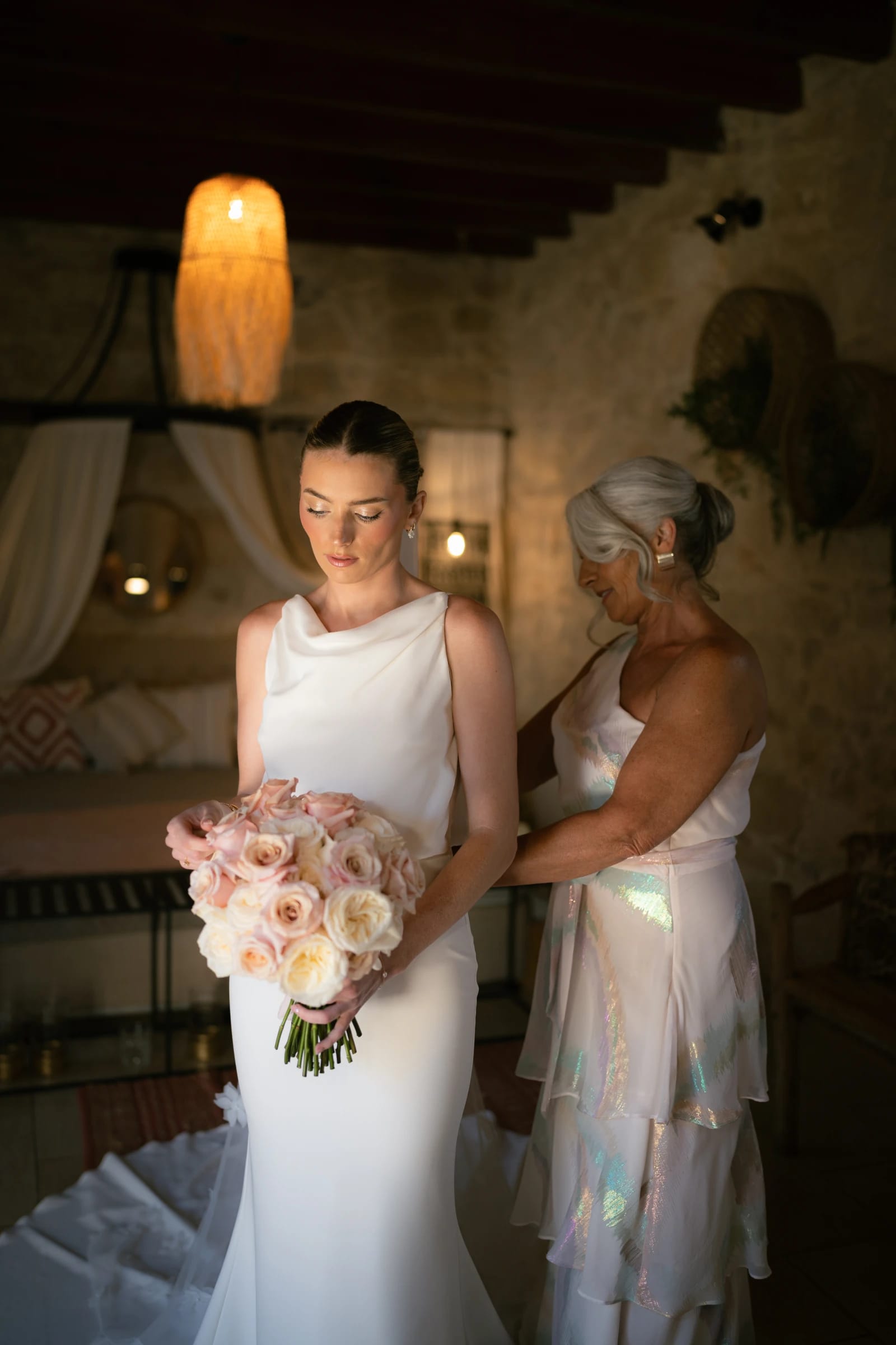 Bailey adjusting her veil in soft morning light at Liopetro wedding venue, Paphos.