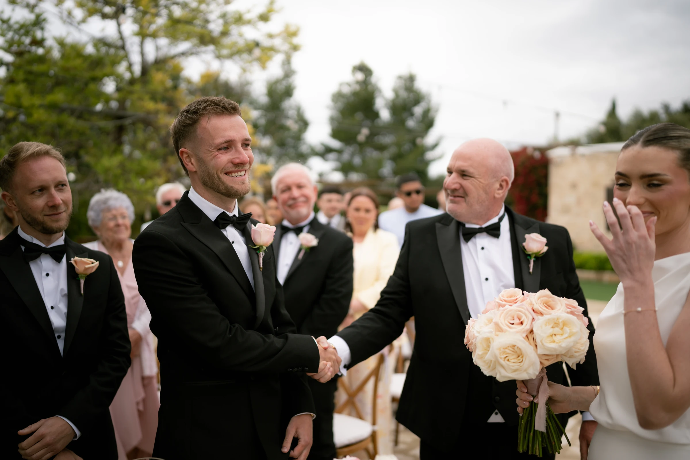 Father giving Bailey away and shaking Daniel's hand at the Liopetro ceremony, Kouklia, Paphos.