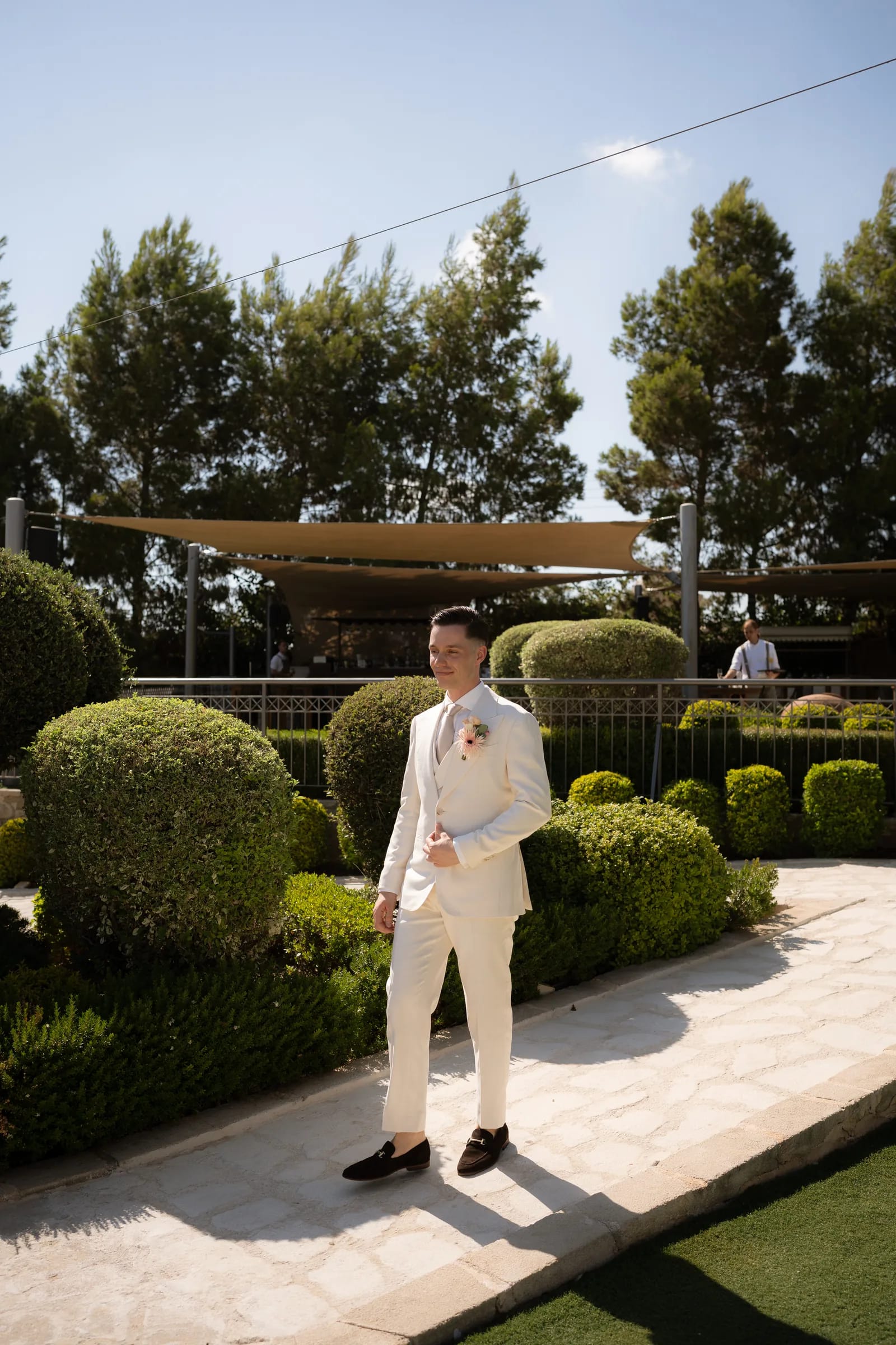 Frank in his cream suit waiting in the box gardens at Liopetro before the ceremony, Kouklia, Paphos, Cyprus.