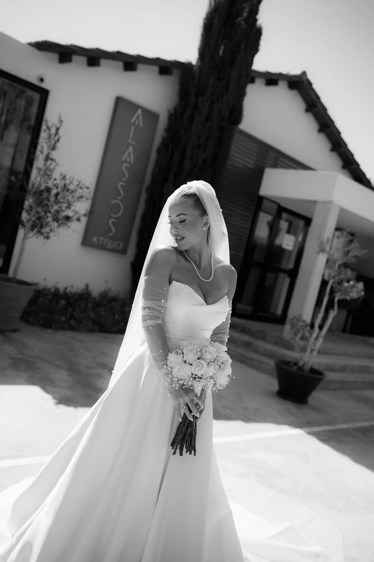 Wedding portrait against open ground at Alassos, Paphos, Cyprus.
